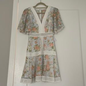 Love Triangle mini dress in printed lace